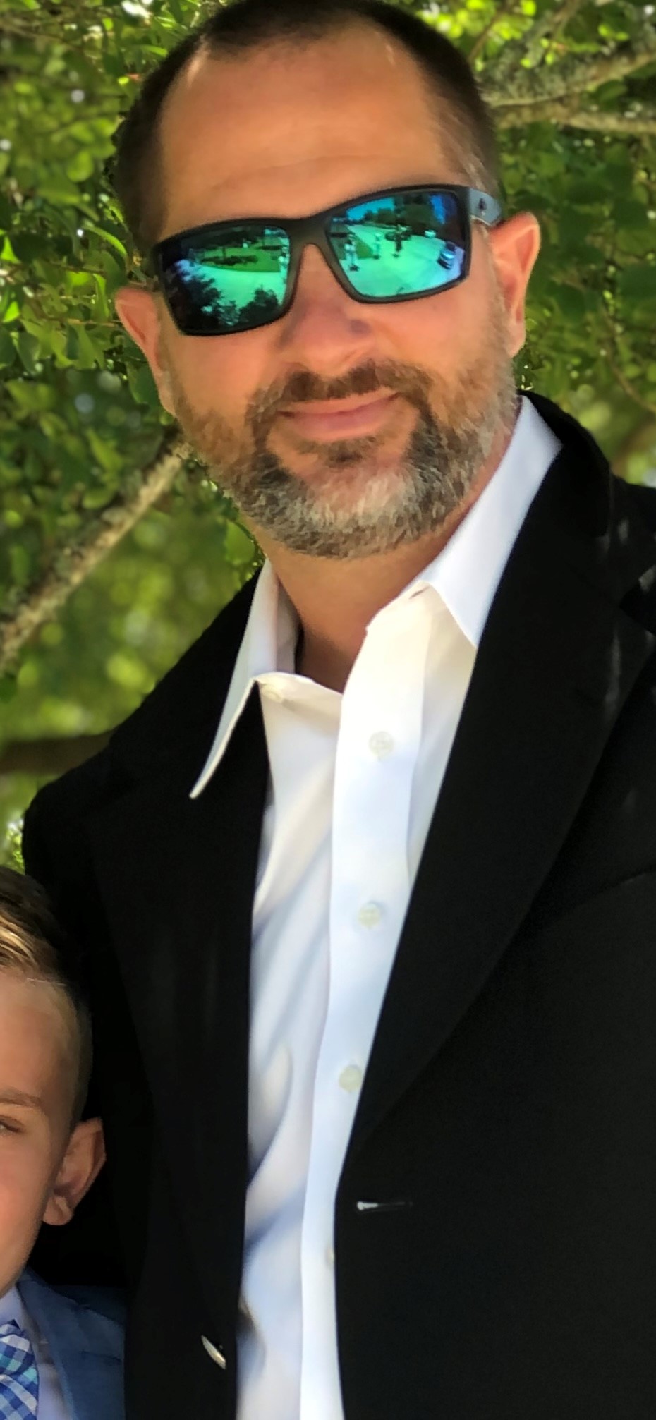 Morgan Descant outdoors in professional attire